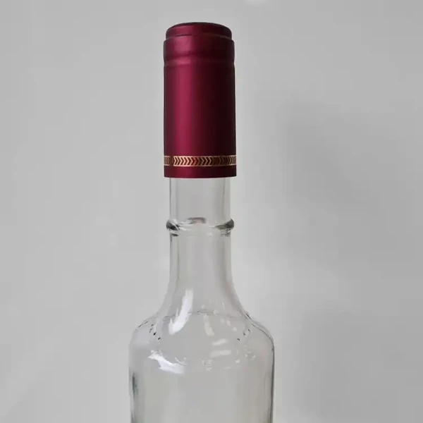 Hőzsugor-fólia / Bordó arany sormintával kapszula